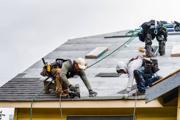 Professional Roofing technician working in Woodbury, PA